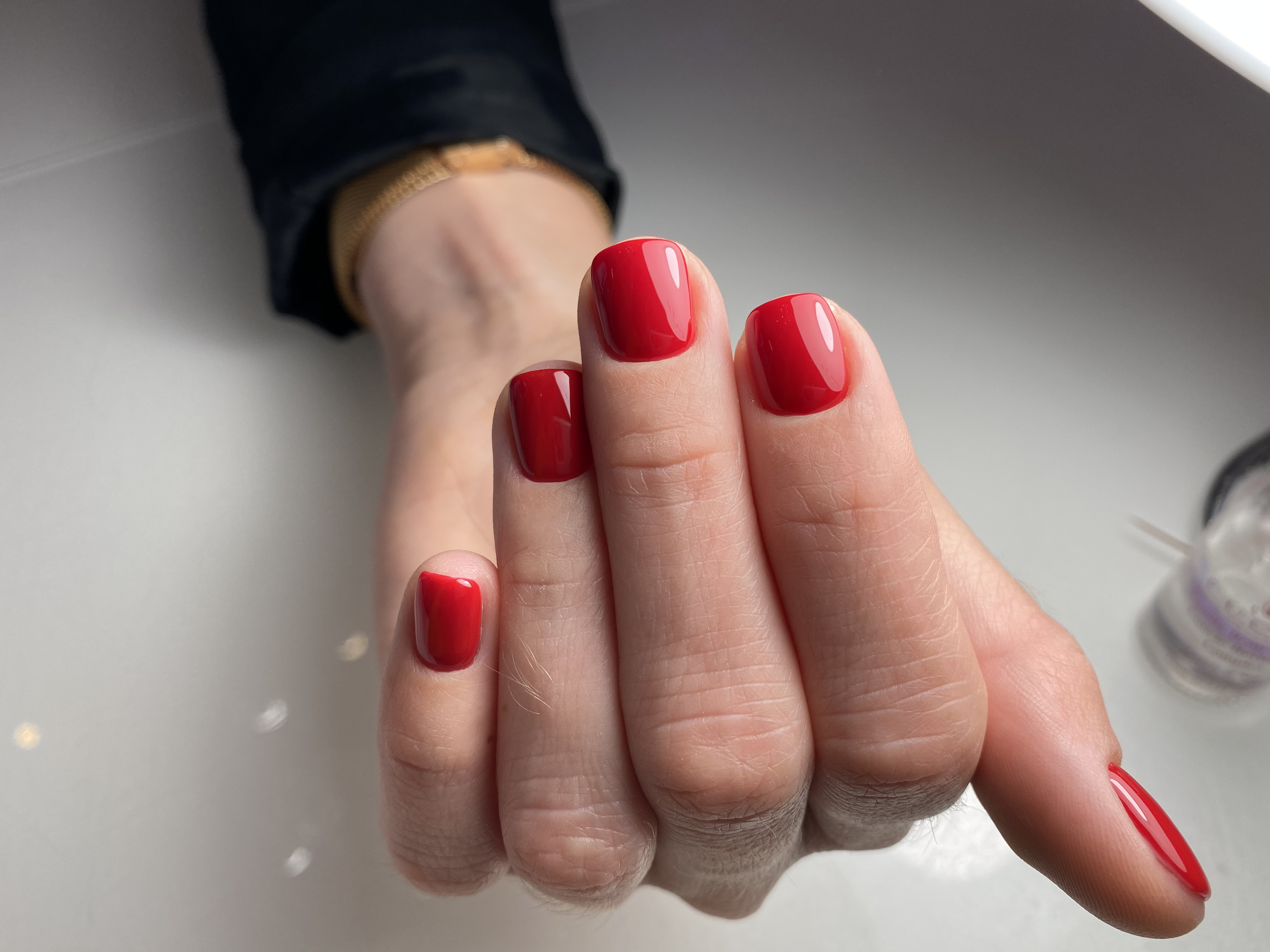A completed Russian manicure showing the clean, close cuticle line the technique is known for