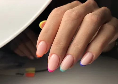 French-tip nail work by a Sublime student